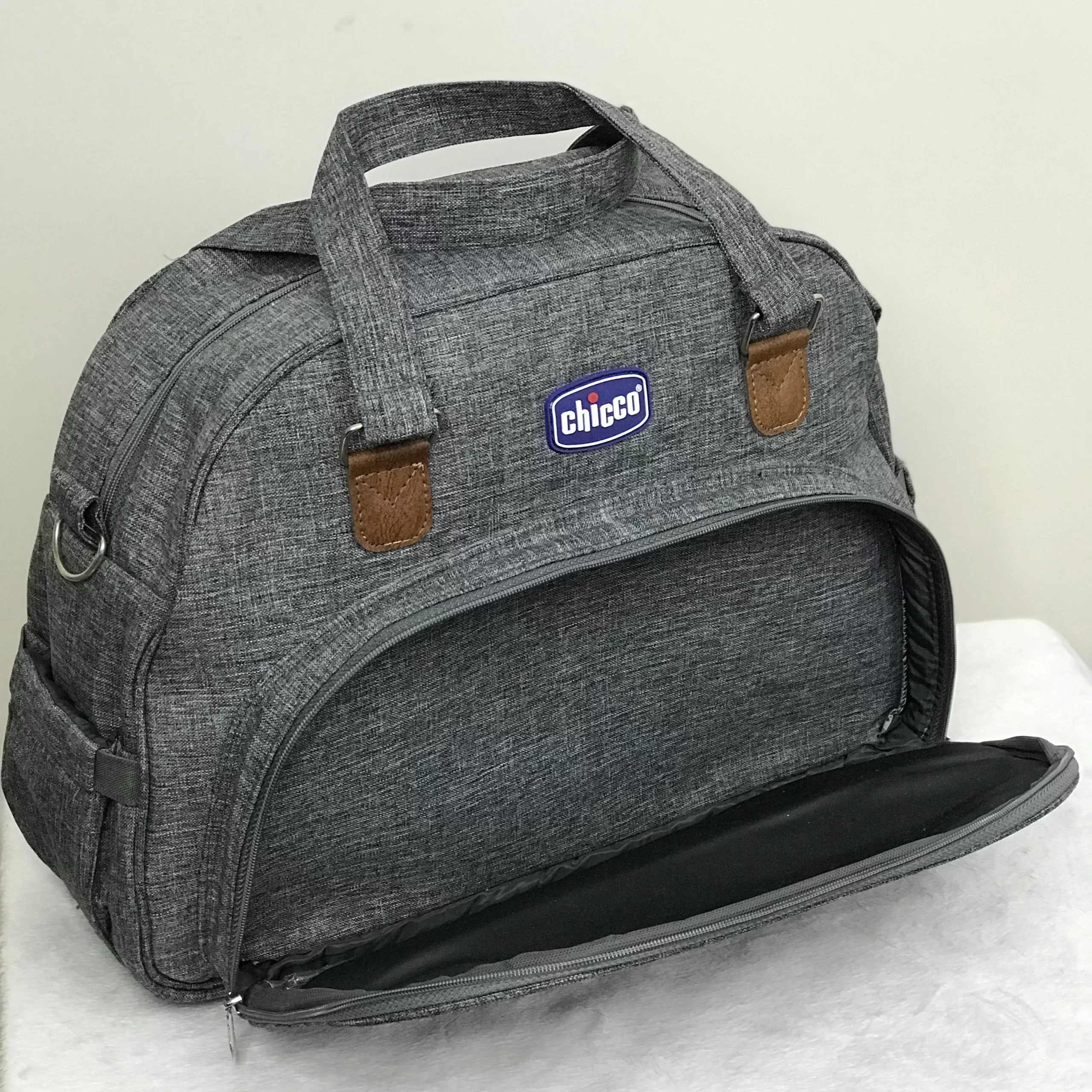 ساک لوازم نوزاد چیکو نما چرم ساک رودوشی وسایل کودک