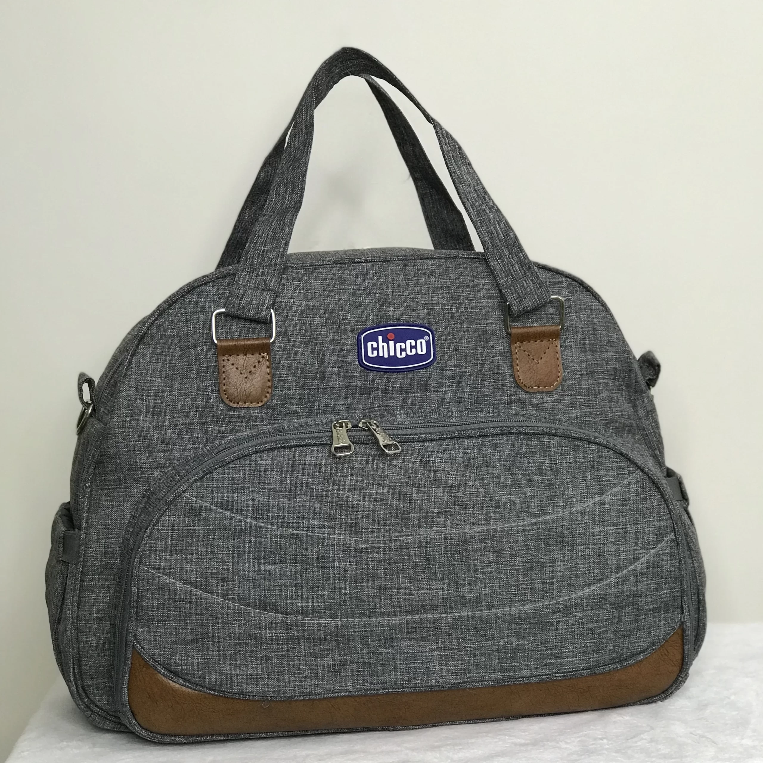 ساک لوازم نوزاد چیکو نما چرم ساک دستی لوازم کودک