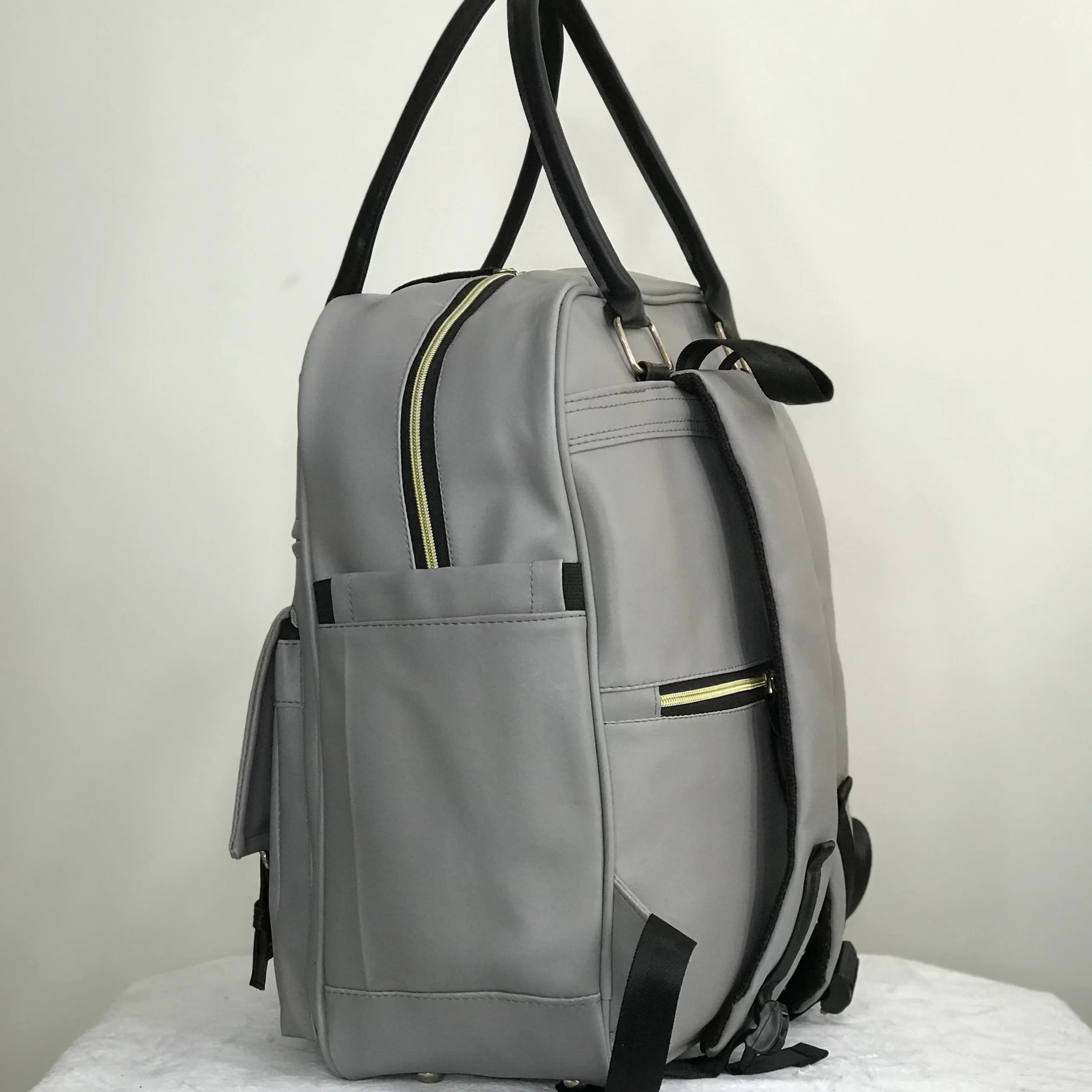 کوله پشتی لوازم نوزاد چرم کاسپین کوله پشتی لوازم نوزاد چرم کاسپین