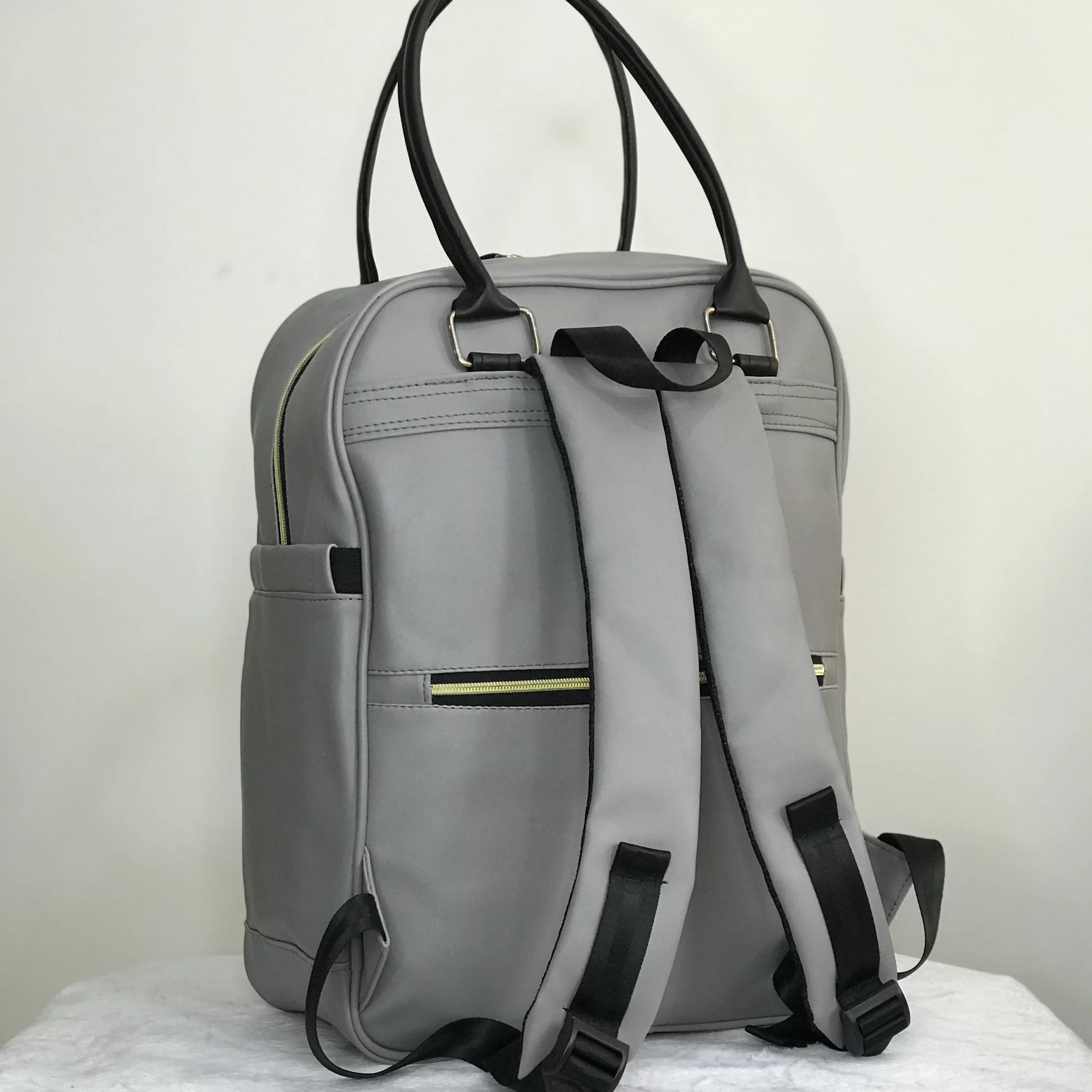 کوله پشتی لوازم نوزاد چرم کاسپین کوله پشتی لوازم مادر و نوزاد چرم کاسپین