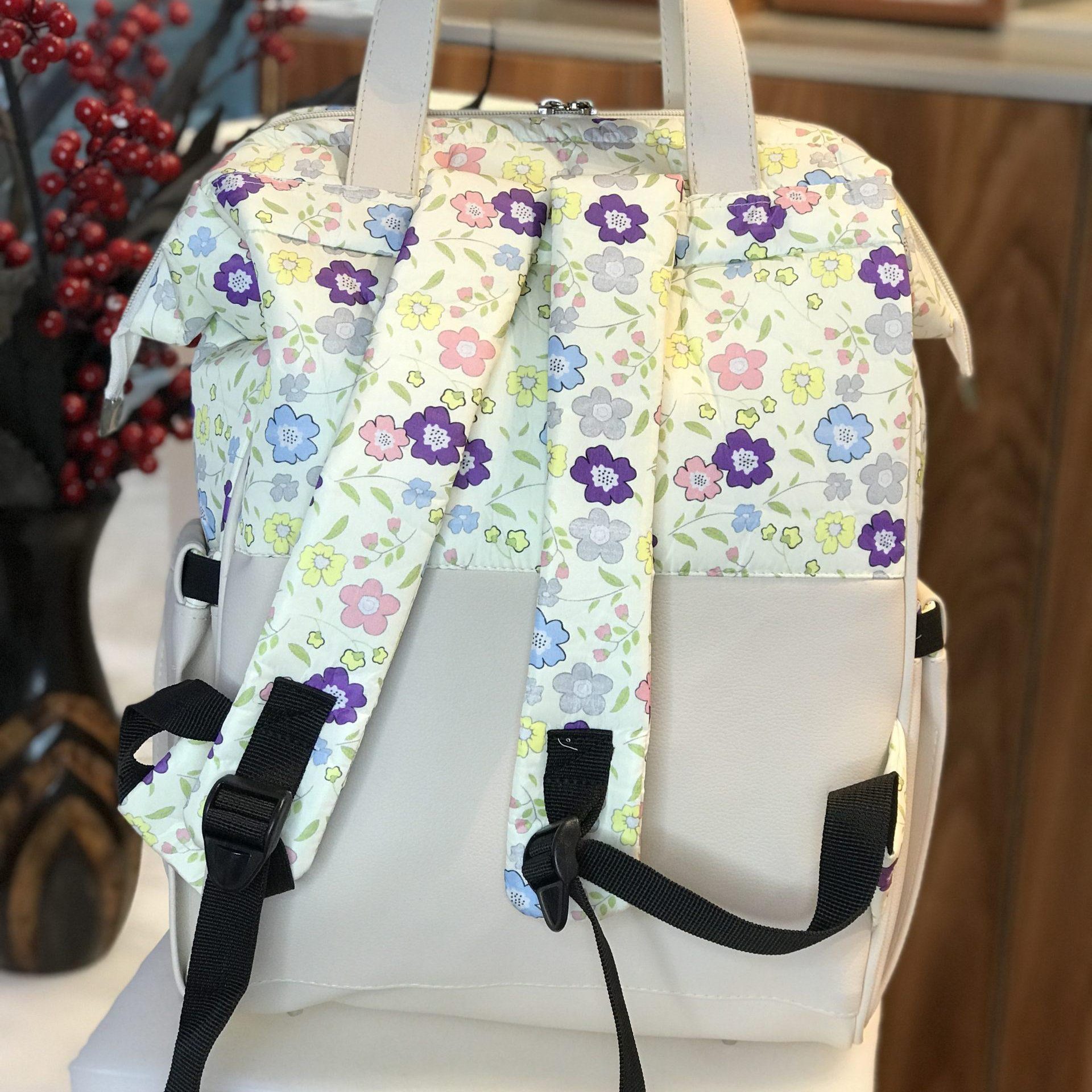 کوله لوازم نوزاد ببتو نما چرم گلدار کوله پشتی وسایل نوزاد طرحدار مدل گلدار-چرمی برند ببتو