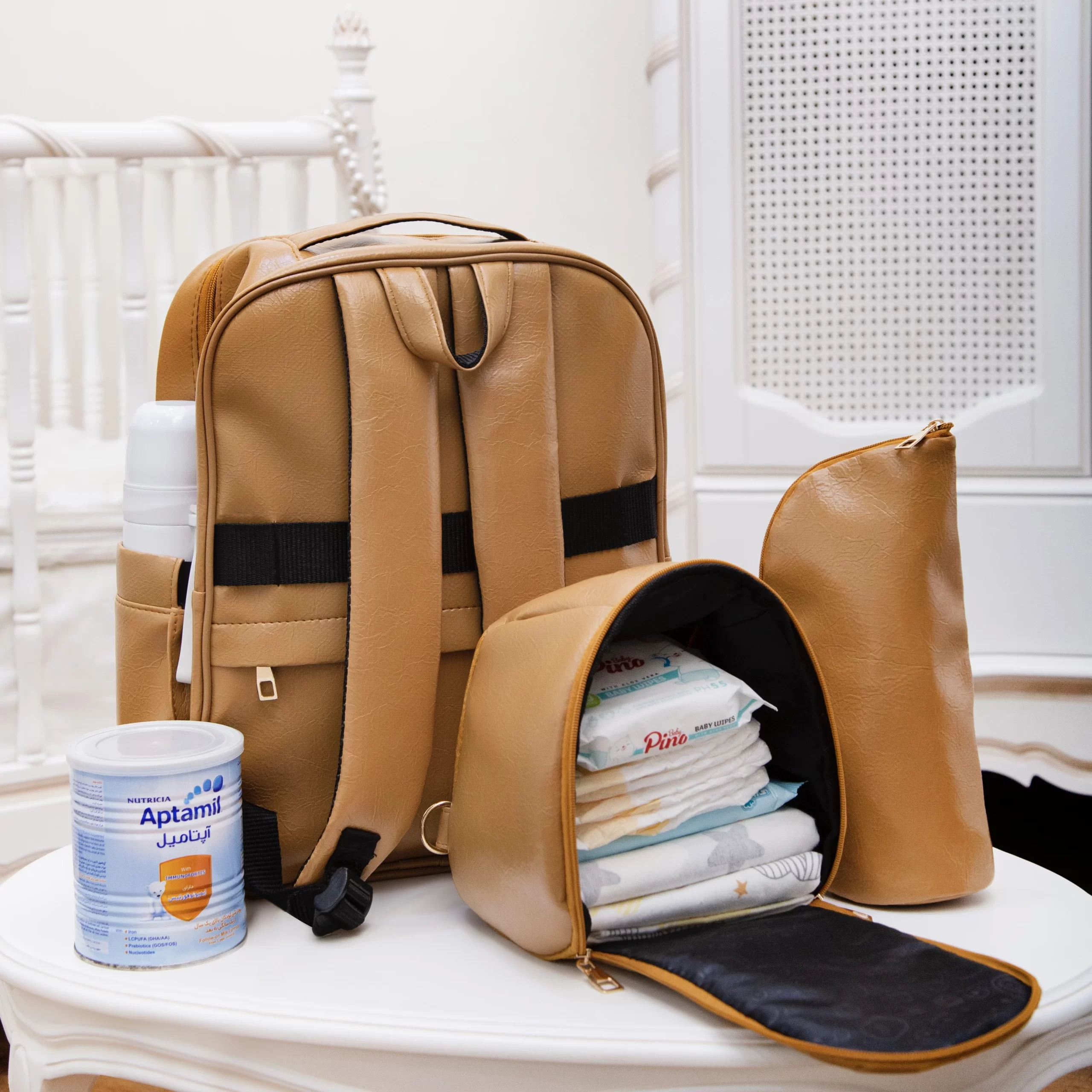 کوله لوازم نوزاد چرم مدل کارگو کیف کوله لوازم نوزاد چرم
