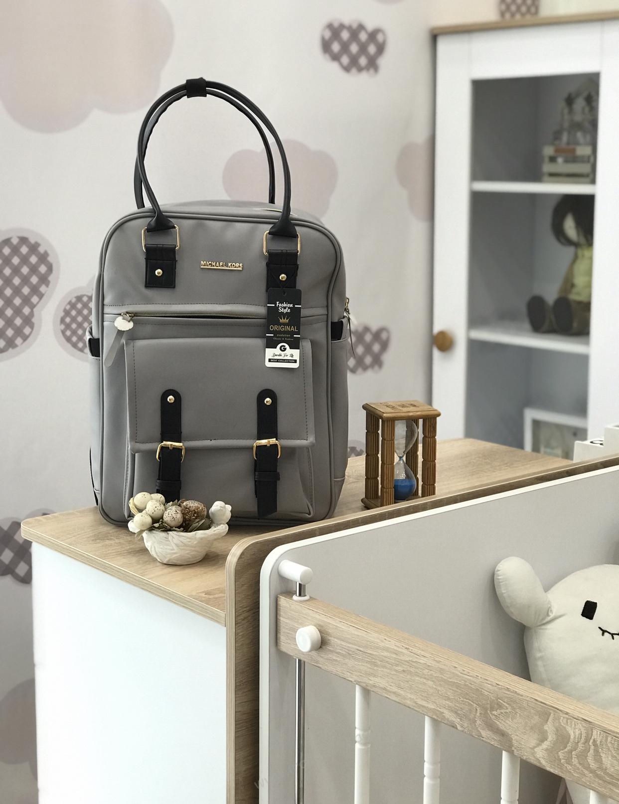 کوله پشتی لوازم نوزاد چرم کوله پشتی لوازم نوزاد چرم