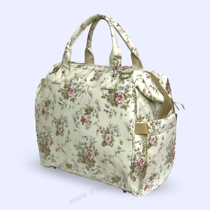 کیف لوازم نوزاد هیوا طرح گلدار کرم کیف دستی لوازم نوزاد