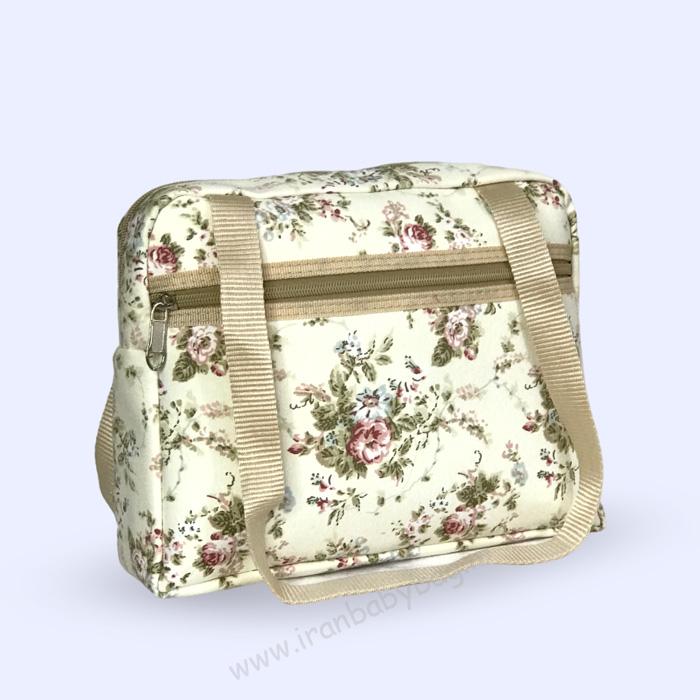 کیف کوچک همراه مدل هیوا طرح گلدار کرم کیف کوچک خمراه ساک لوازم مادر و نوزاد