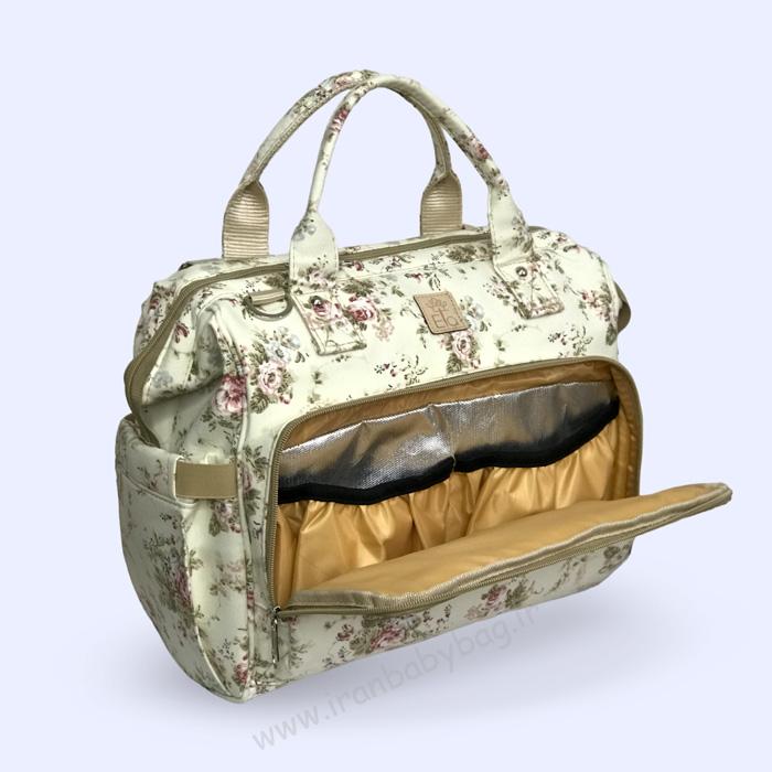 کیف لوازم نوزاد هیوا طرح گلدار کرم کیف وسایل مادر و کودک