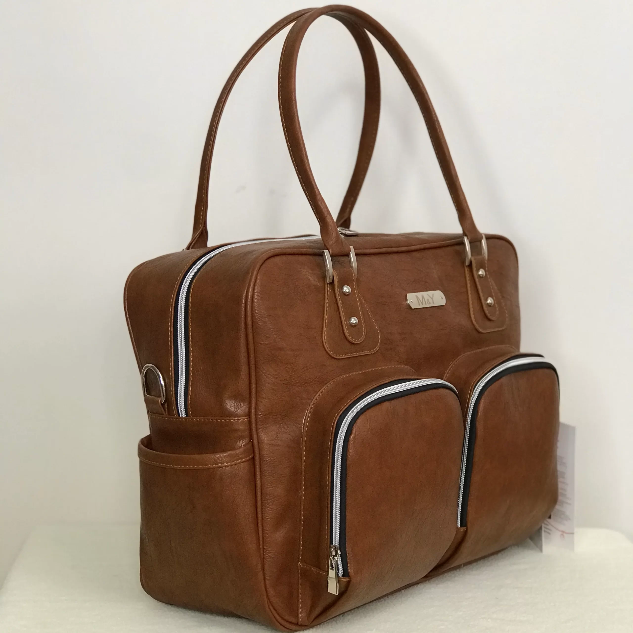 ساک لوازم نوزاد دو جیب ساک رودوشی لوازم نوزاد چرم