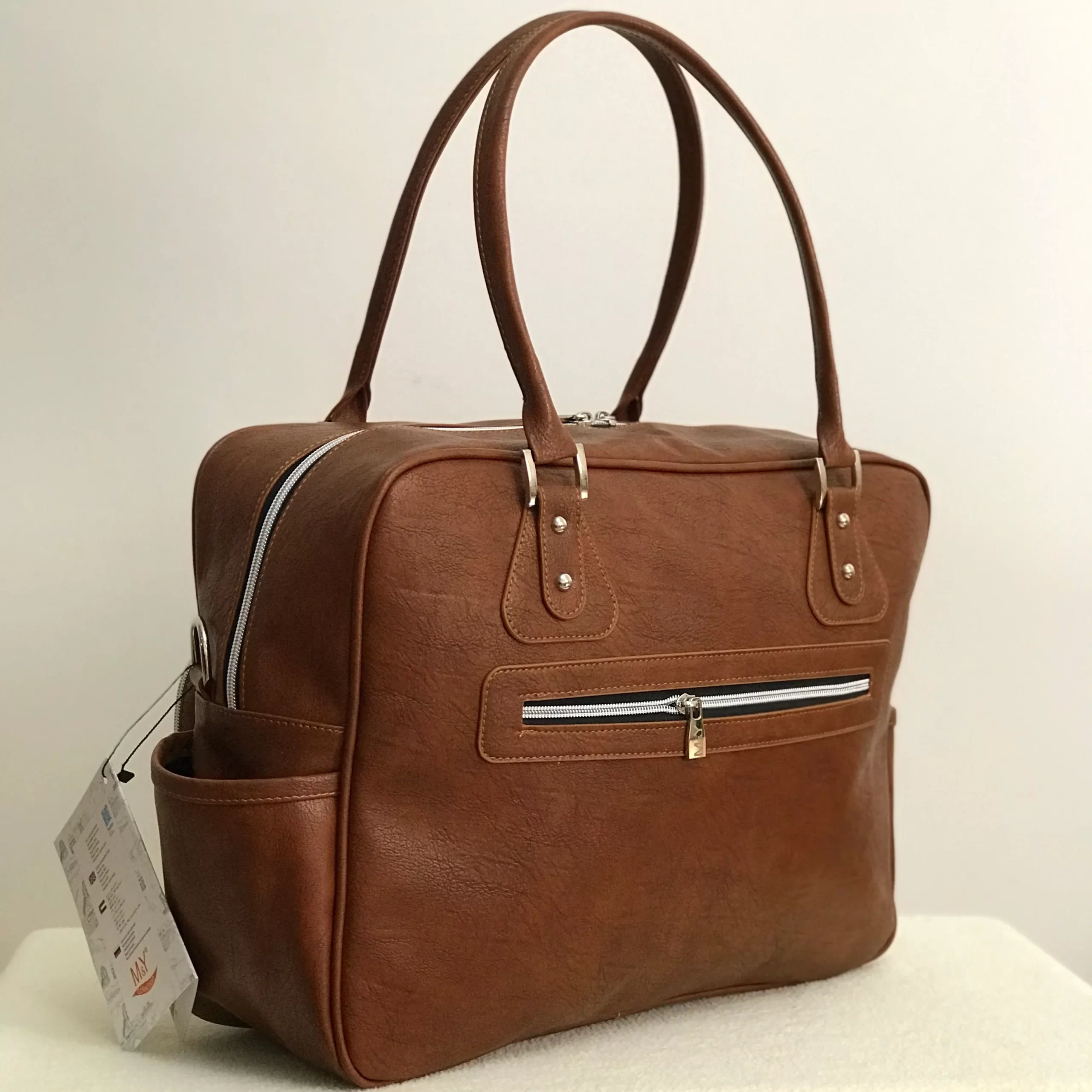 ساک لوازم نوزاد دو جیب ساک لوازم نوزاد چرم